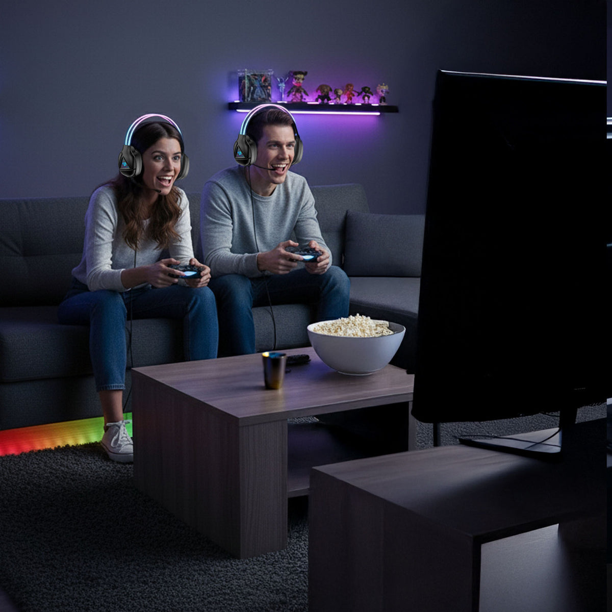Laser RGB Infinity gaming headphones worn by couple playing console games on a couch