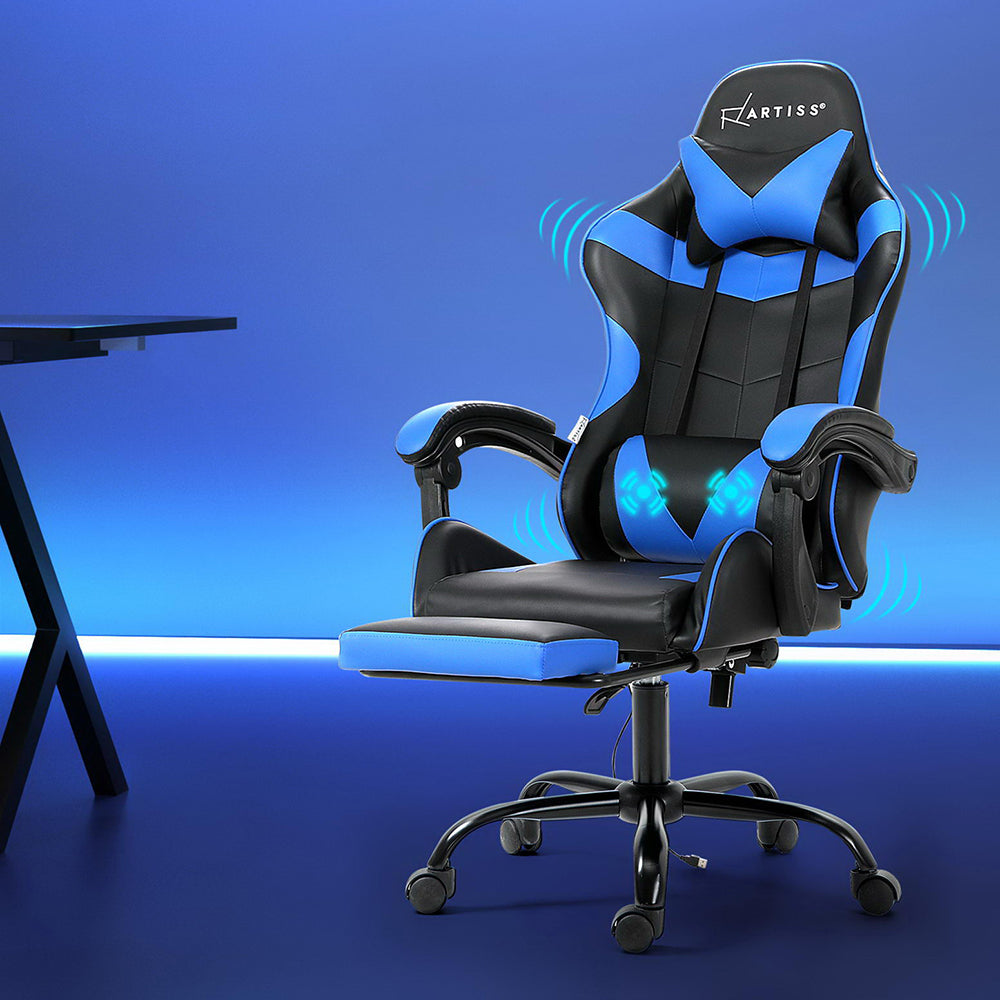 Artiss black and blue 2-point massage gaming chair beside a desk in a blue-lit gaming room