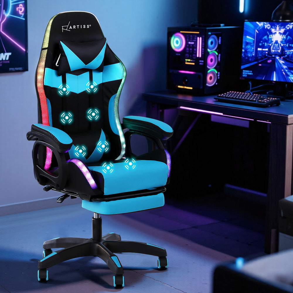 Artiss cyan RGB LED gaming chair shown in a dark gaming room with PC tower and dual monitors