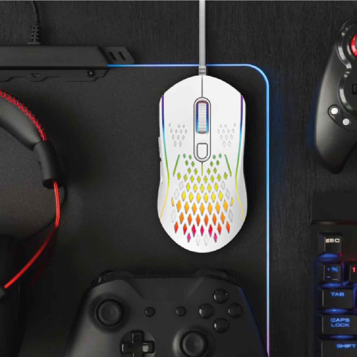 Top down flat-lay of Laser RGB lightweight gaming mouse white with controller, headset and keyboard