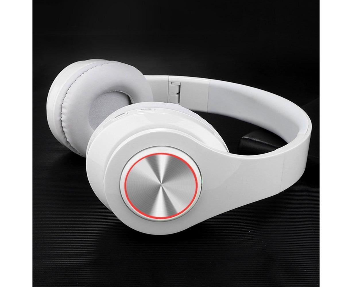 JX-59 white headphones folded on a dark surface, highlighting metallic earcup with red LED ring